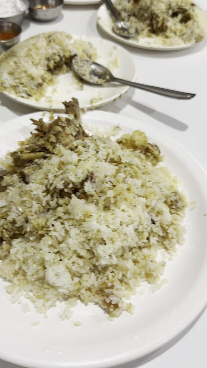 Biryani plates on a Sagar table